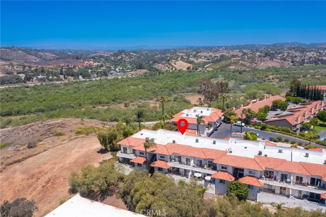 a view of a city with a building in the background
