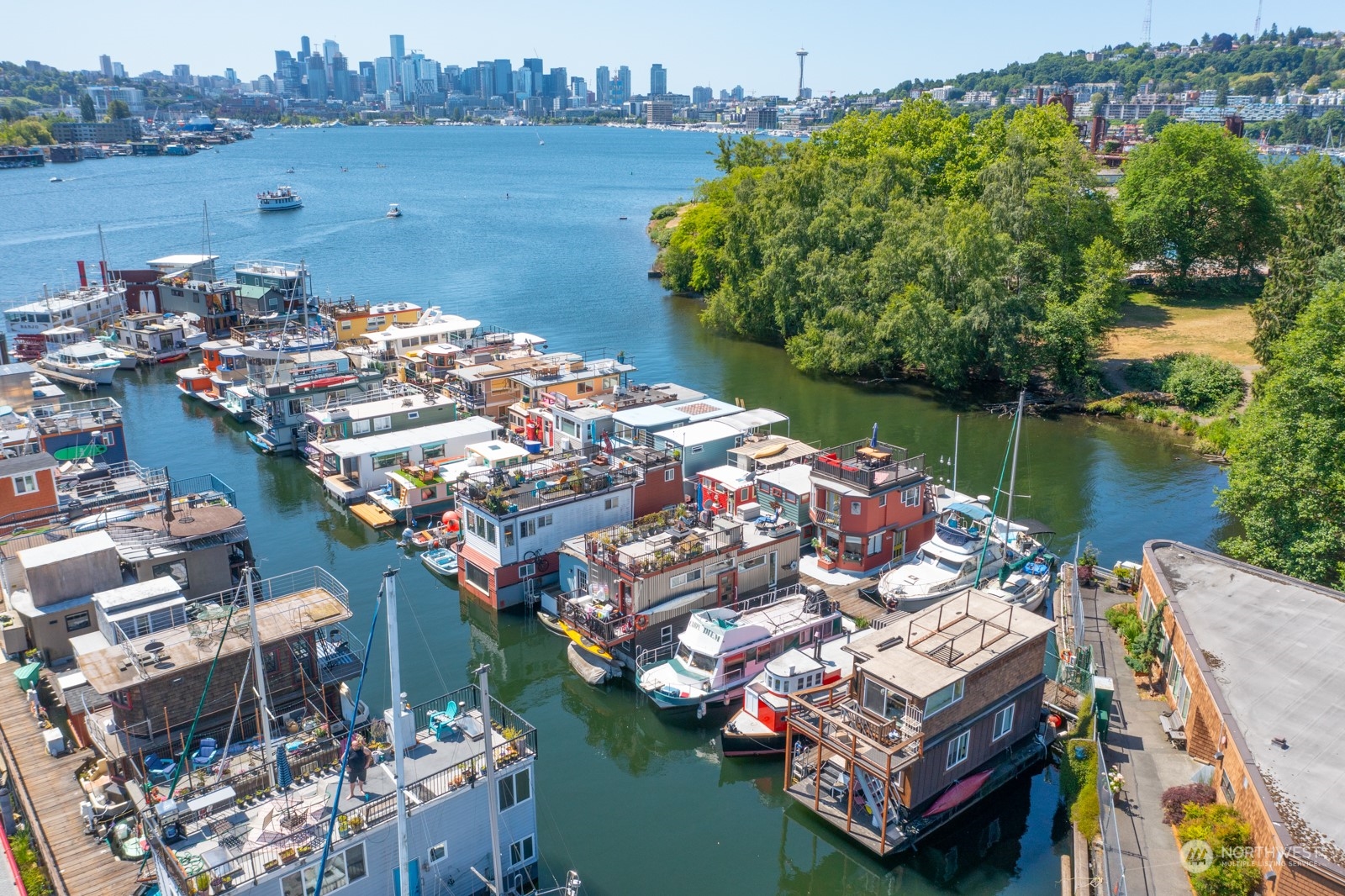 2143 North Northlake Way, Unit 34 Seattle, WA 98103 - Photo 17 of 26 a aerial view of a house with a lake view