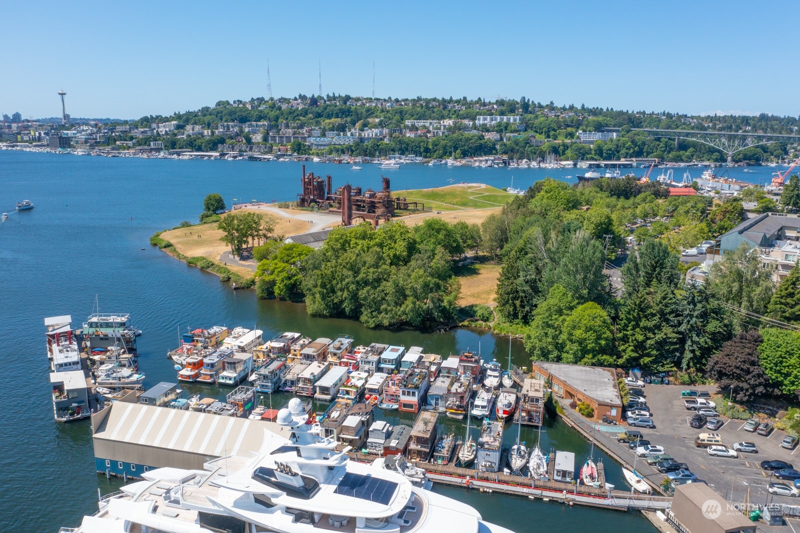 2143 North Northlake Way, Unit 34 Seattle, WA 98103 - Photo 21 of 26 a view of a lake with a city