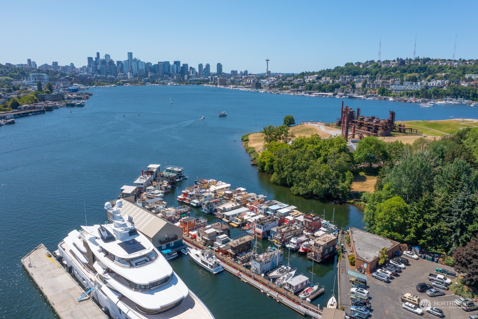 2143 North Northlake Way, Unit 34 Seattle, WA 98103 - Photo 22 of 26 a view of a lake with a city