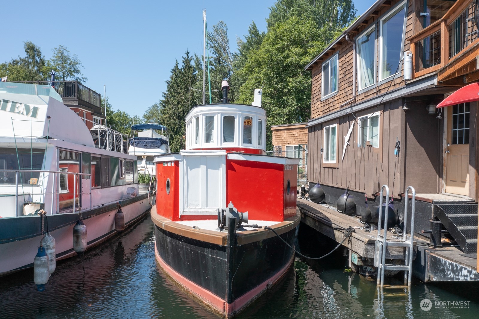 2143 North Northlake Way, Unit 34 Seattle, WA 98103 - Photo 24 of 26 a view of living room with deck and outdoor seating