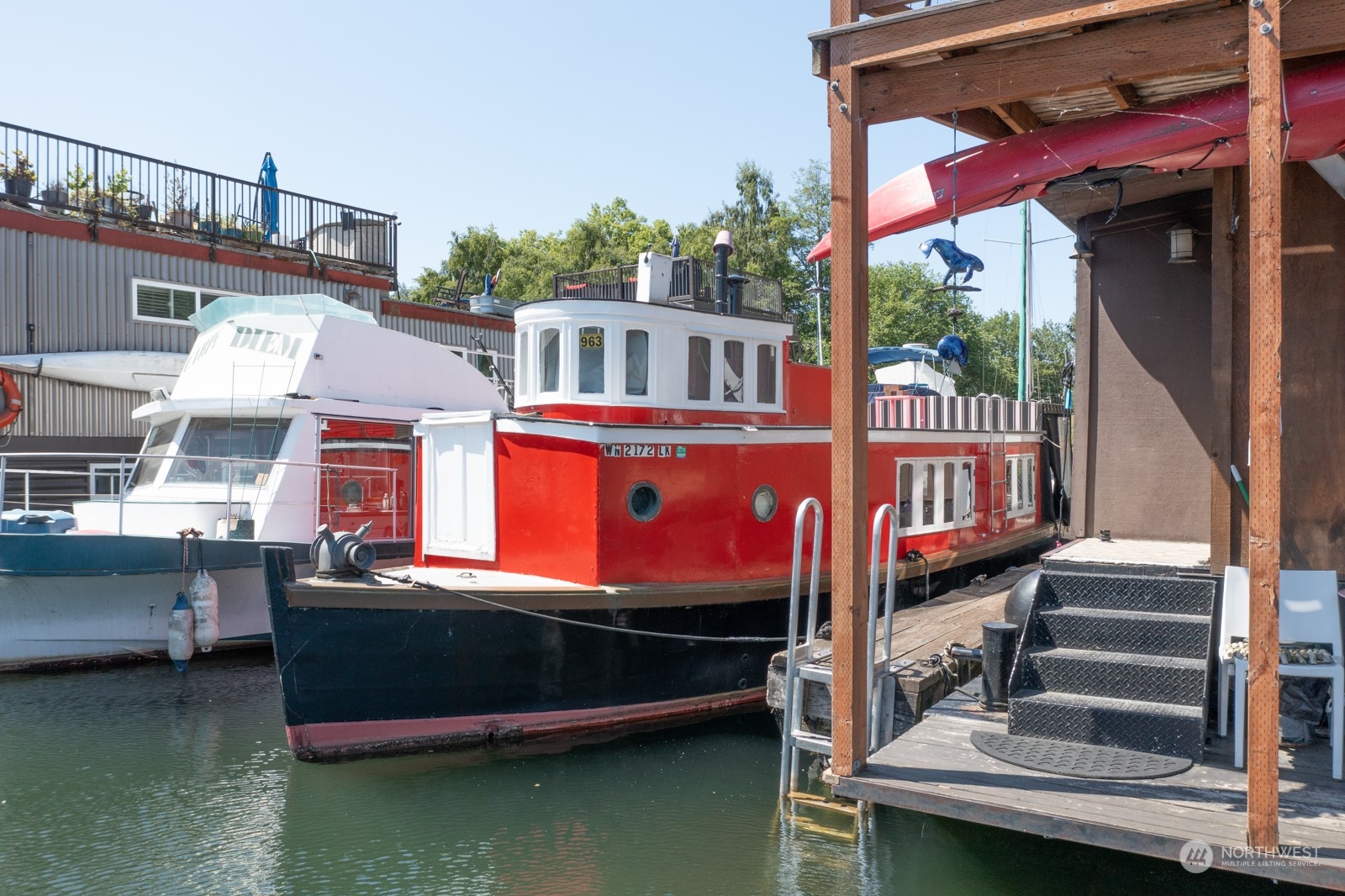 2143 North Northlake Way, Unit 34 Seattle, WA 98103 - Photo 25 of 26 a view of a house with pool and sitting area