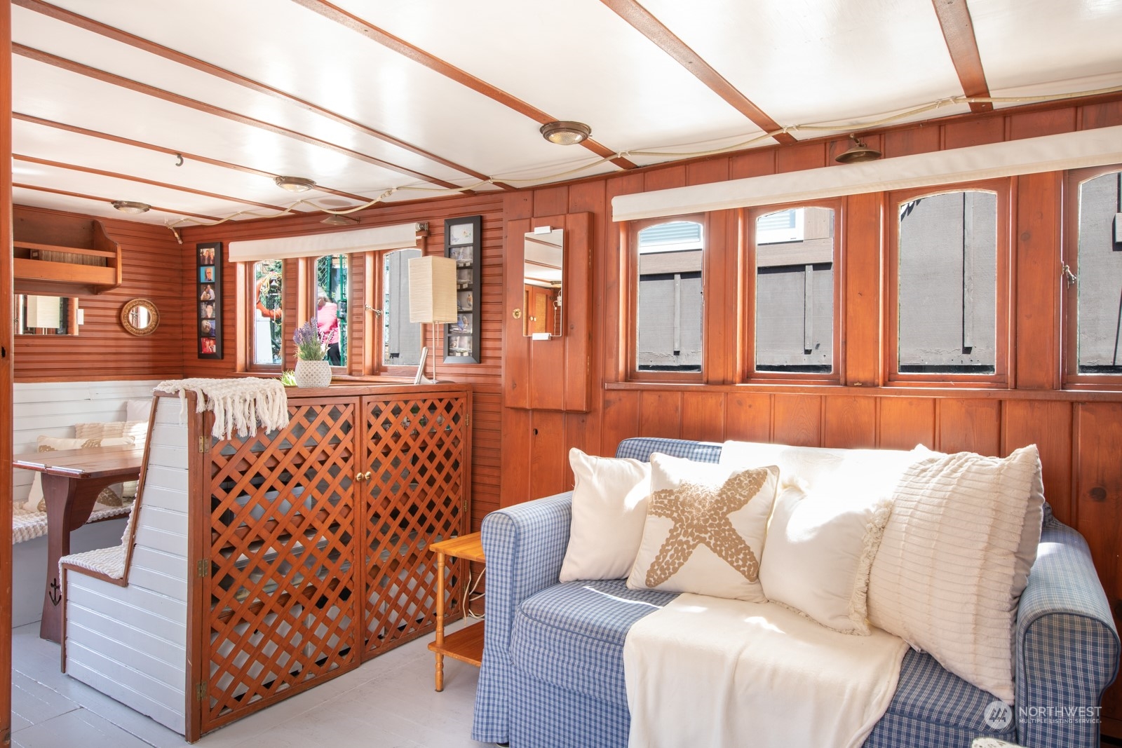 2143 North Northlake Way, Unit 34 Seattle, WA 98103 - Photo 3 of 26 a living room with furniture and a large window
