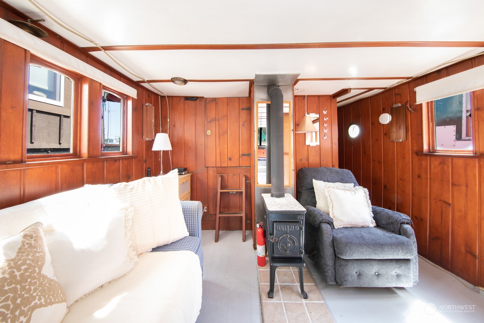 2143 North Northlake Way, Unit 34 Seattle, WA 98103 - Photo 5 of 26 a living room with furniture and large windows