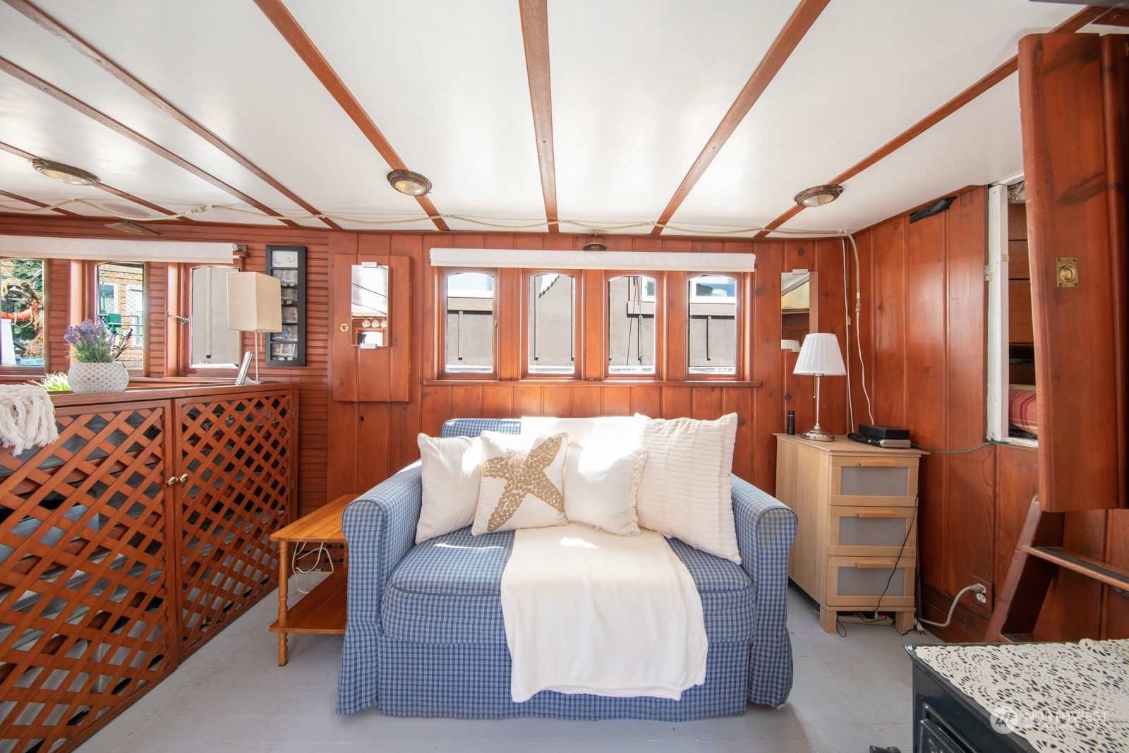 2143 North Northlake Way, Unit 34 Seattle, WA 98103 - Photo 6 of 26 a living room with furniture and a large window