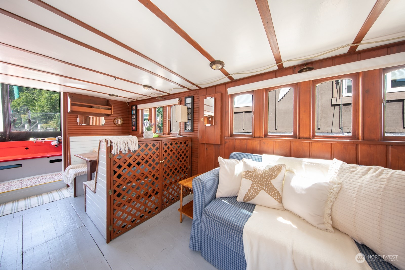 2143 North Northlake Way, Unit 34 Seattle, WA 98103 - Photo 7 of 26 a bedroom with furniture and large window