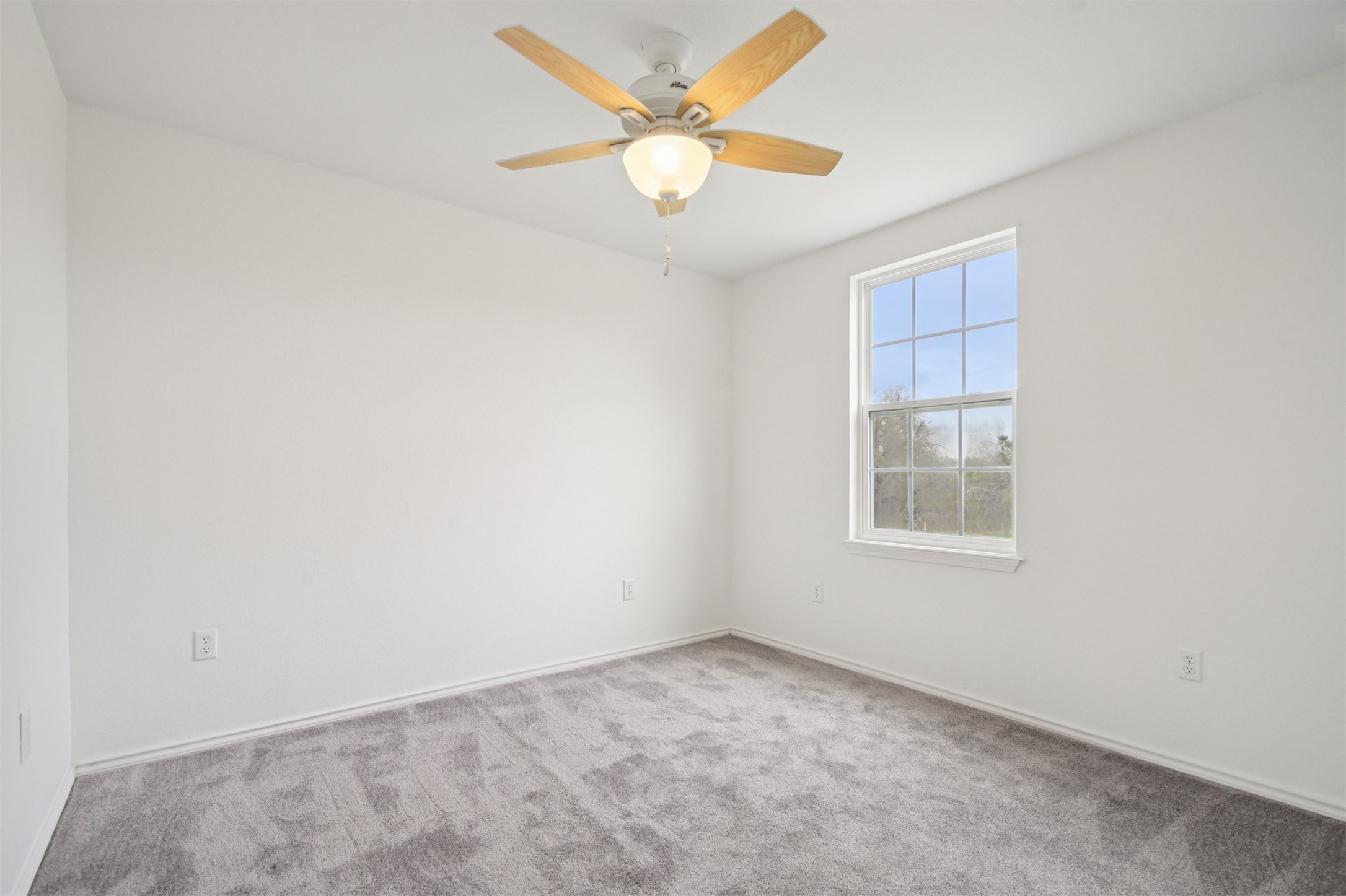 1470 Oak Grove Road Leander, TX 78641 - Photo 20 of 38 an empty room with a window and a fan