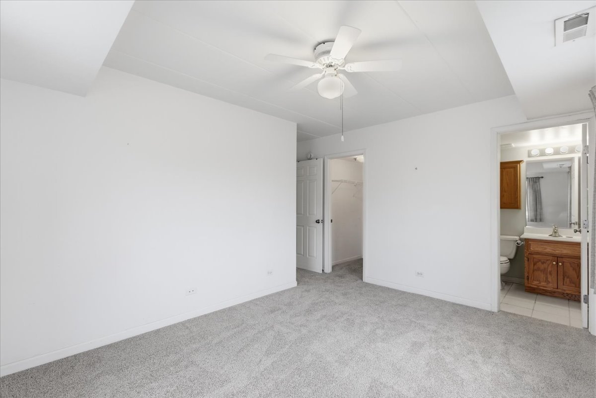 7316 40th Street, Unit 2E Lyons, IL 60534 - Photo 7 of 14 an empty room with a bathroom