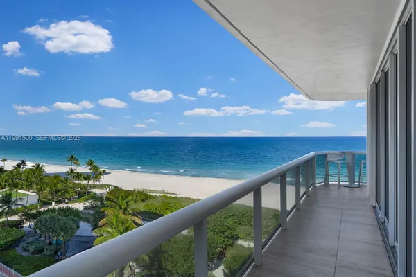 a view of a balcony with an outdoor space