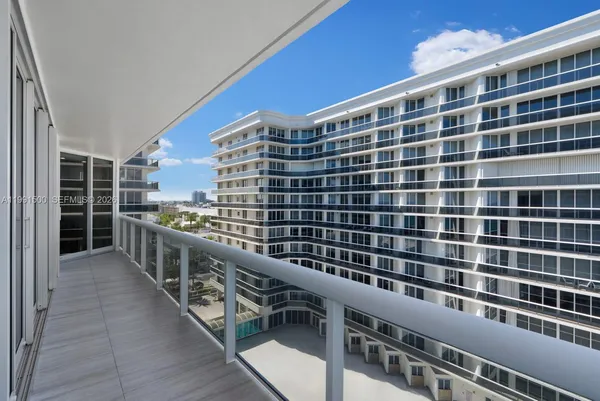 a view of a balcony with city view