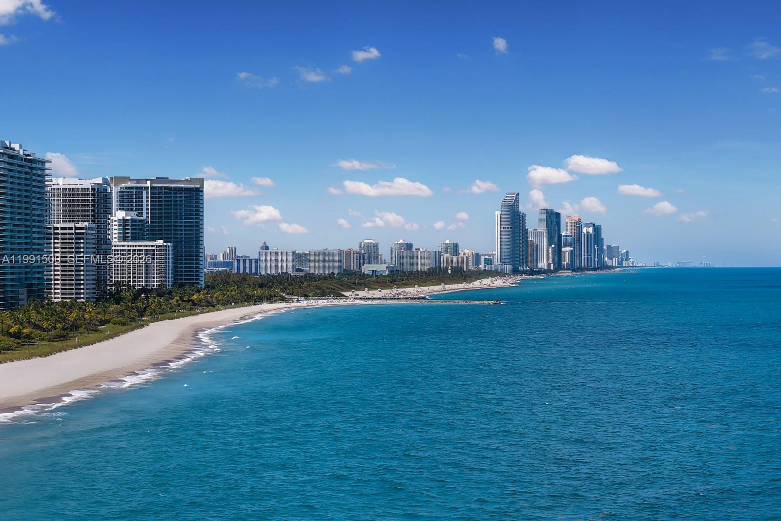 9559 Collins Avenue, Unit S8B Surfside, FL 33154 - Photo 39 of 42 a view of a house with a yard