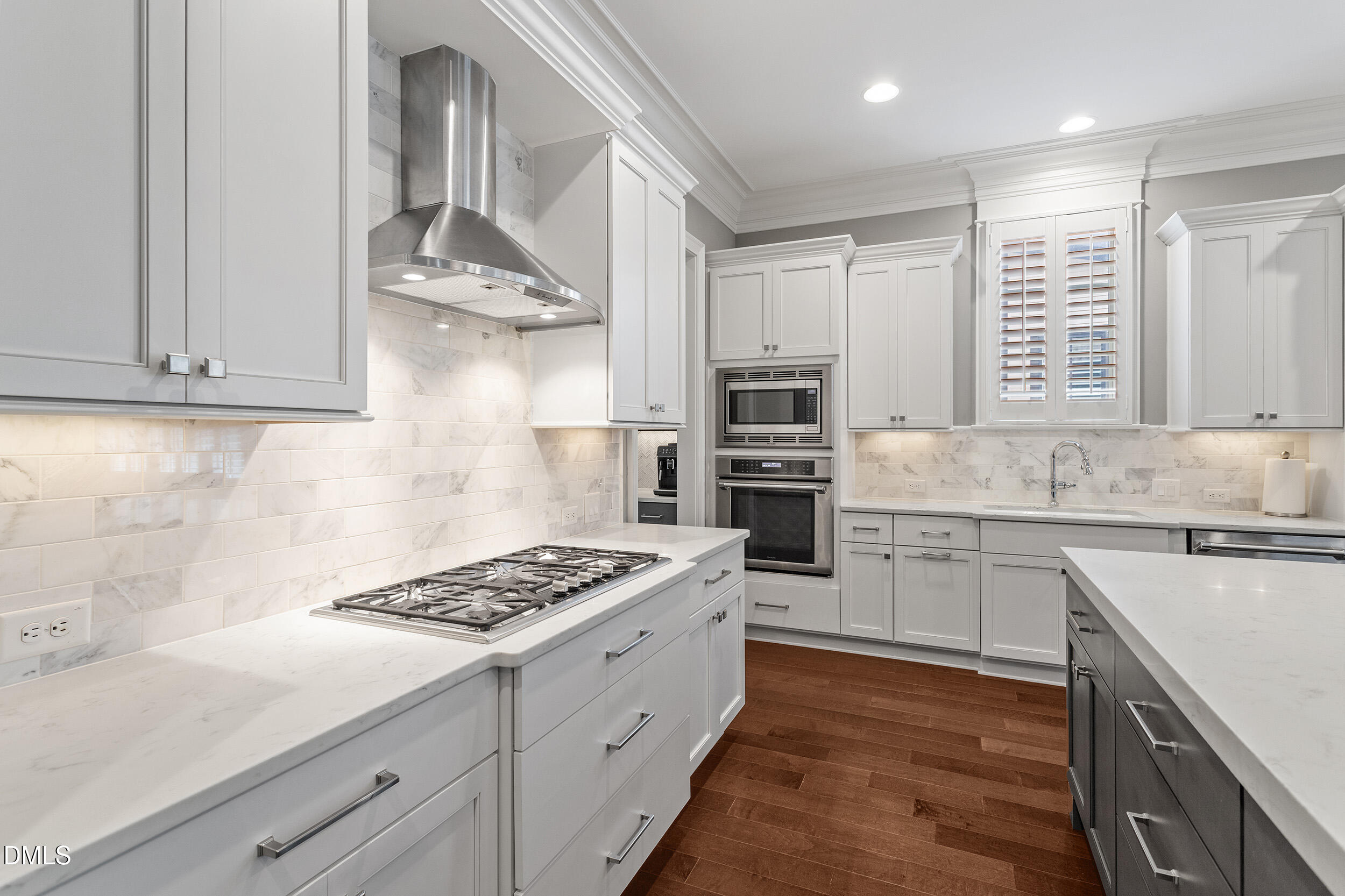 1361 Queensferry Road Cary, NC 27511 - Photo 20 of 50 a kitchen with stainless steel appliances a sink stove and cabinets
