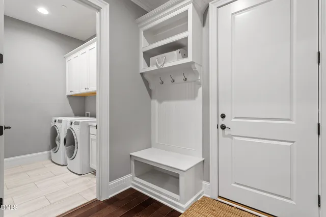 a view of storage and utility room with empty racks