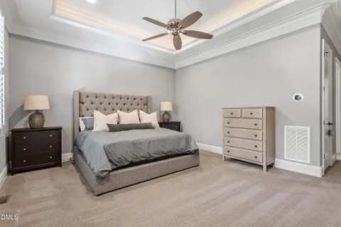 a bedroom with a bed and a closet