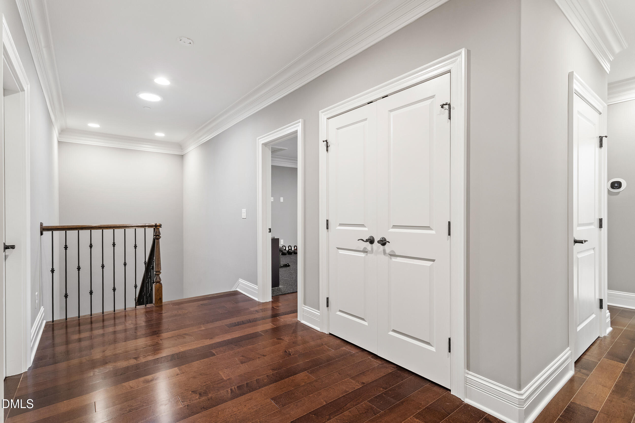1361 Queensferry Road Cary, NC 27511 - Photo 32 of 50 a view of a hallway with wooden floor