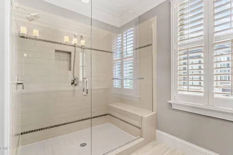 a bathroom with a shower and a bathtub