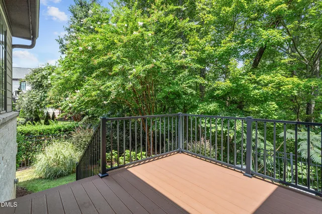 a view of balcony with wooden floor