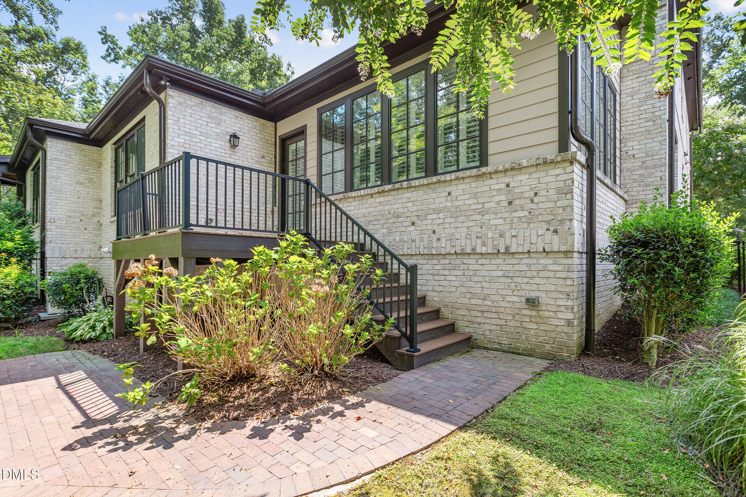 1361 Queensferry Road Cary, NC 27511 - Photo 47 of 50 a view of a house with a garden