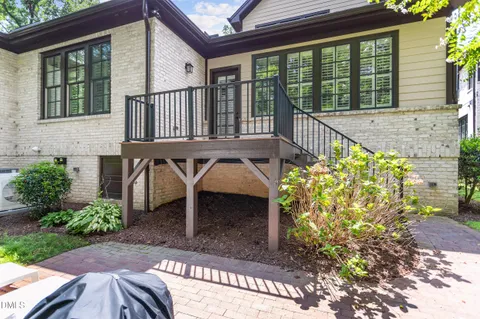 a view of balcony with furniture