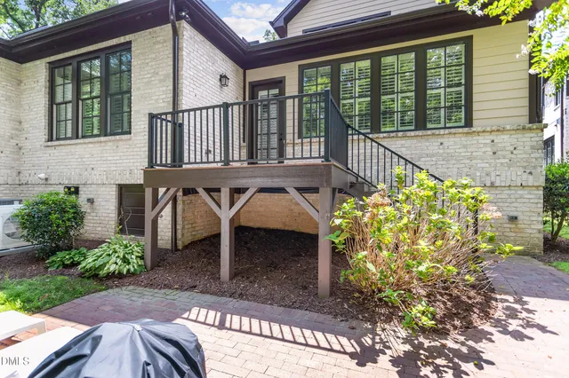 a view of balcony with furniture