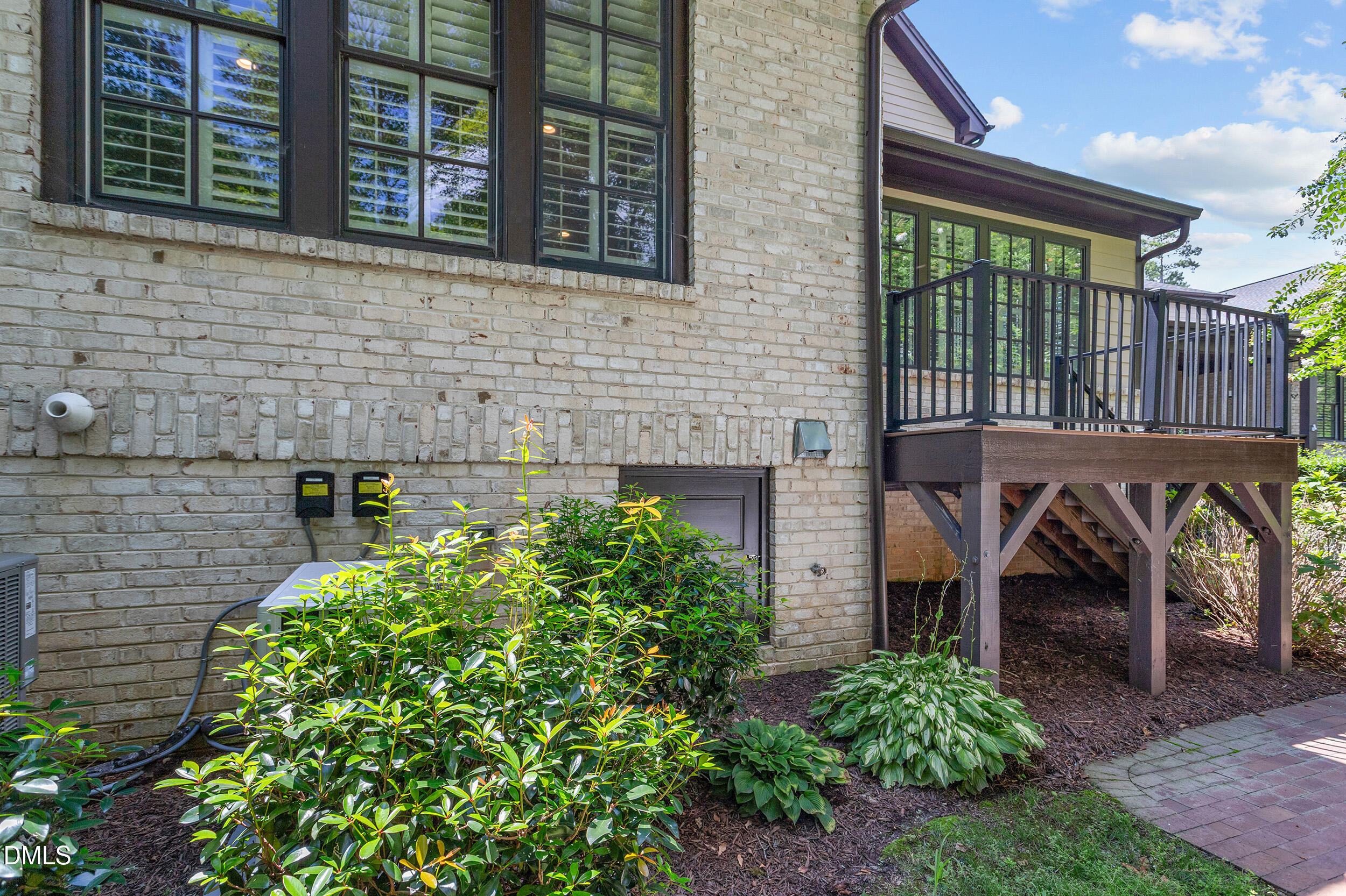 1361 Queensferry Road Cary, NC 27511 - Photo 49 of 50 a view of a patio with table and chairs and potted plants