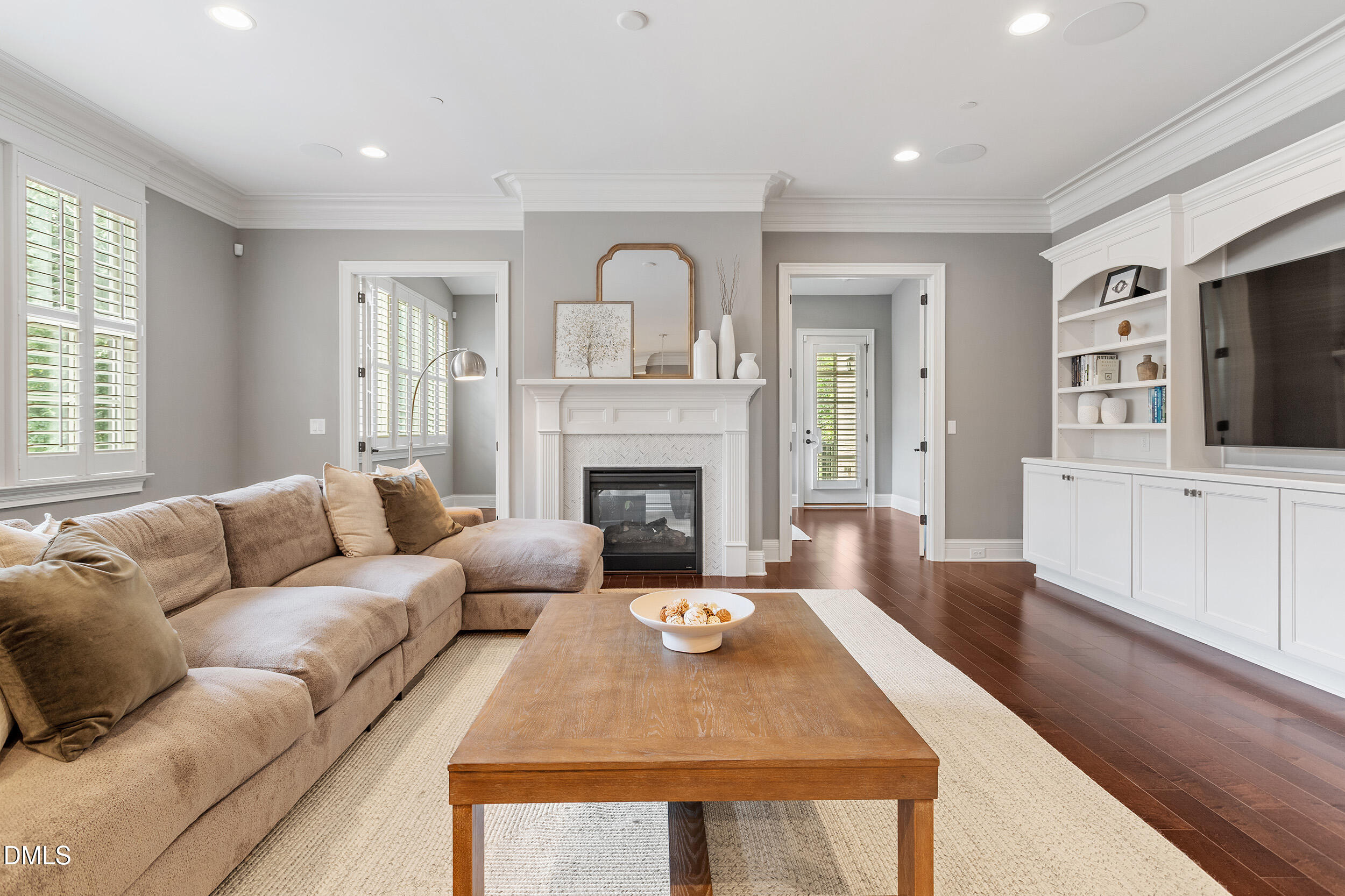 1361 Queensferry Road Cary, NC 27511 - Photo 9 of 50 a living room with furniture and a fireplace