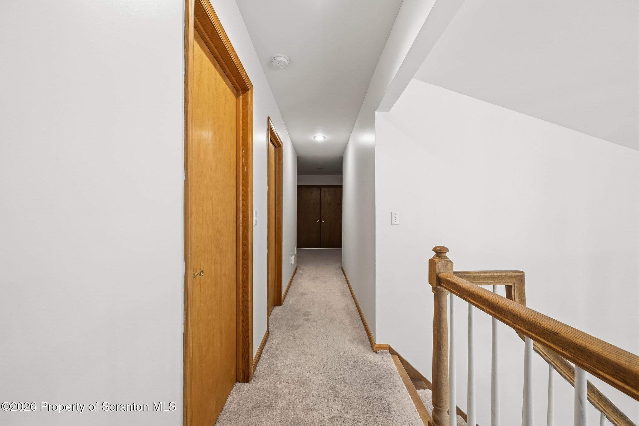 58 Bender Road Gouldsboro, PA 18424 - Photo 32 of 55 a view of a hallway with wooden floor