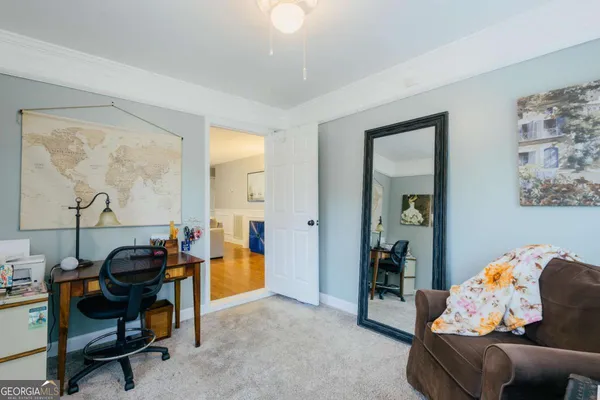 a room with furniture and a window