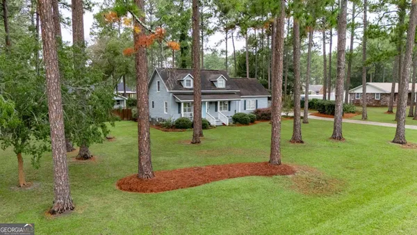 a view of a house with a park