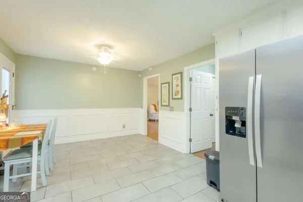 a bathroom with a shower and a sink