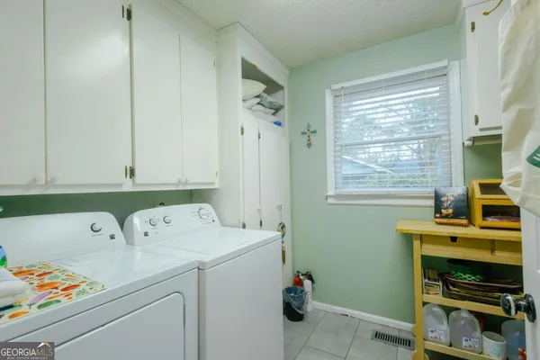 a view of a bathroom from a hallway