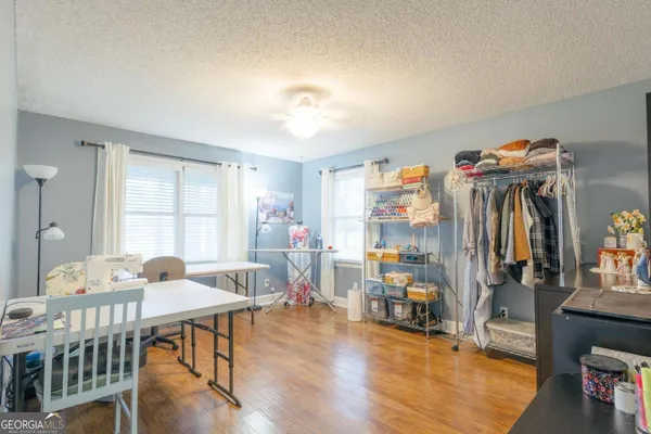 a view of a workspace with furniture