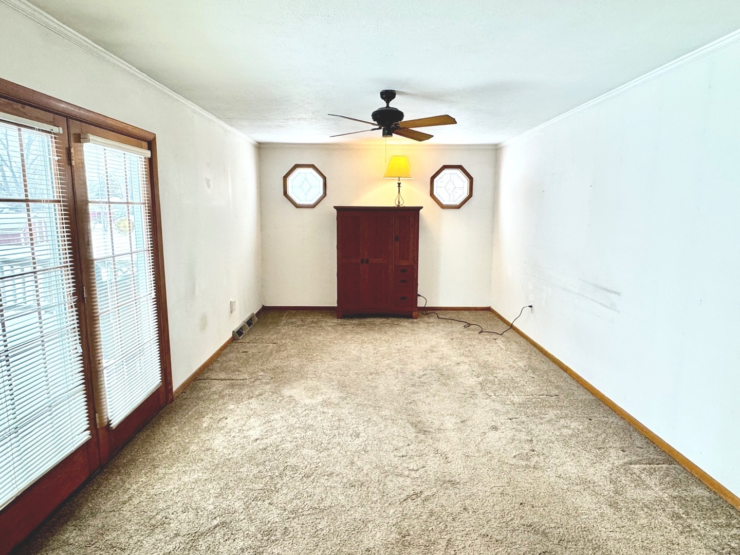 219 William Street New Lenox, IL 60451 - Photo 11 of 29 an empty room with windows