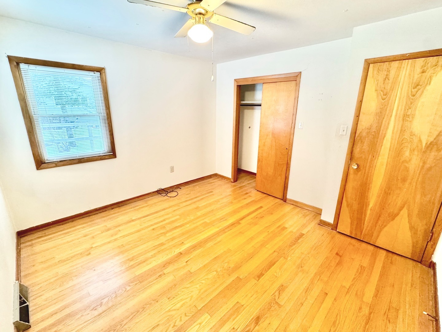 219 William Street New Lenox, IL 60451 - Photo 19 of 29 a view of an empty room with a window