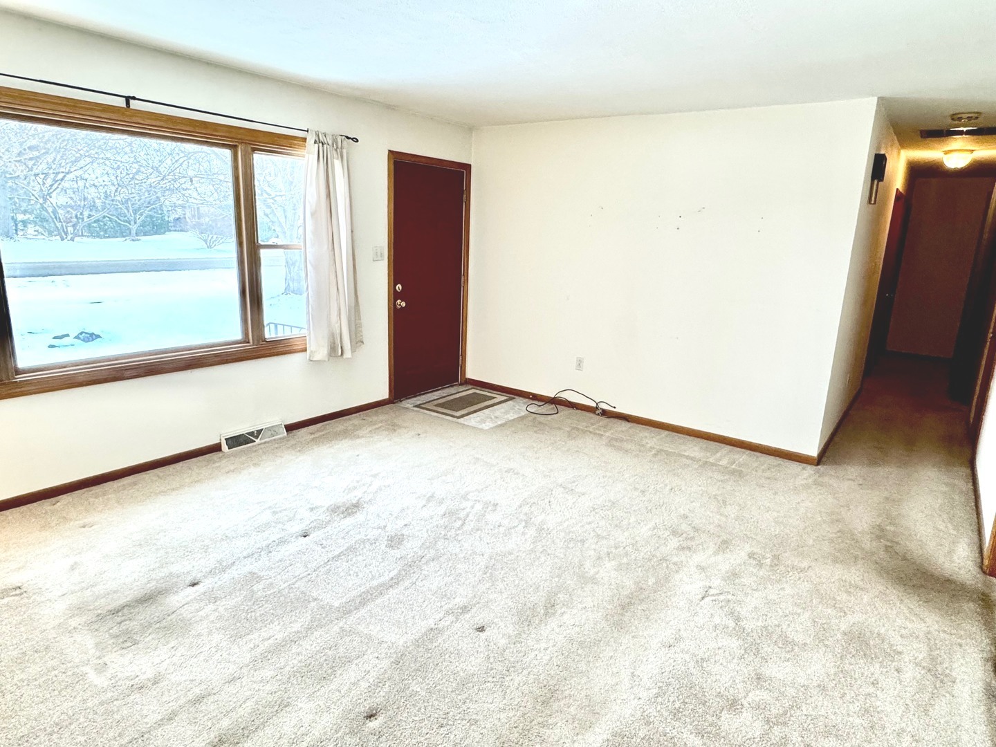 219 William Street New Lenox, IL 60451 - Photo 4 of 29 a view of an empty room with a window