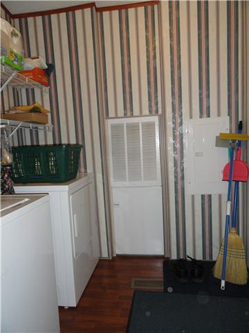 1160 Powdermill Br Road Summertown, TN 38483 - Photo 18 of 20 Separate Laundry/Utility Room with a door to the covered Back Deck.