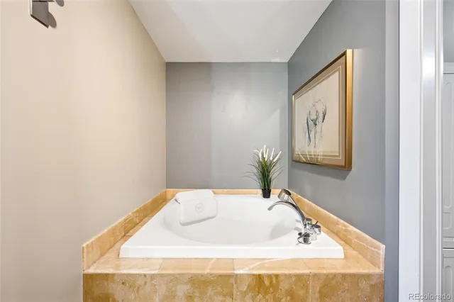 a bath tub sitting in a bathroom