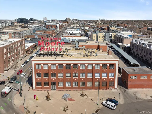 a front view of a building with outdoor space