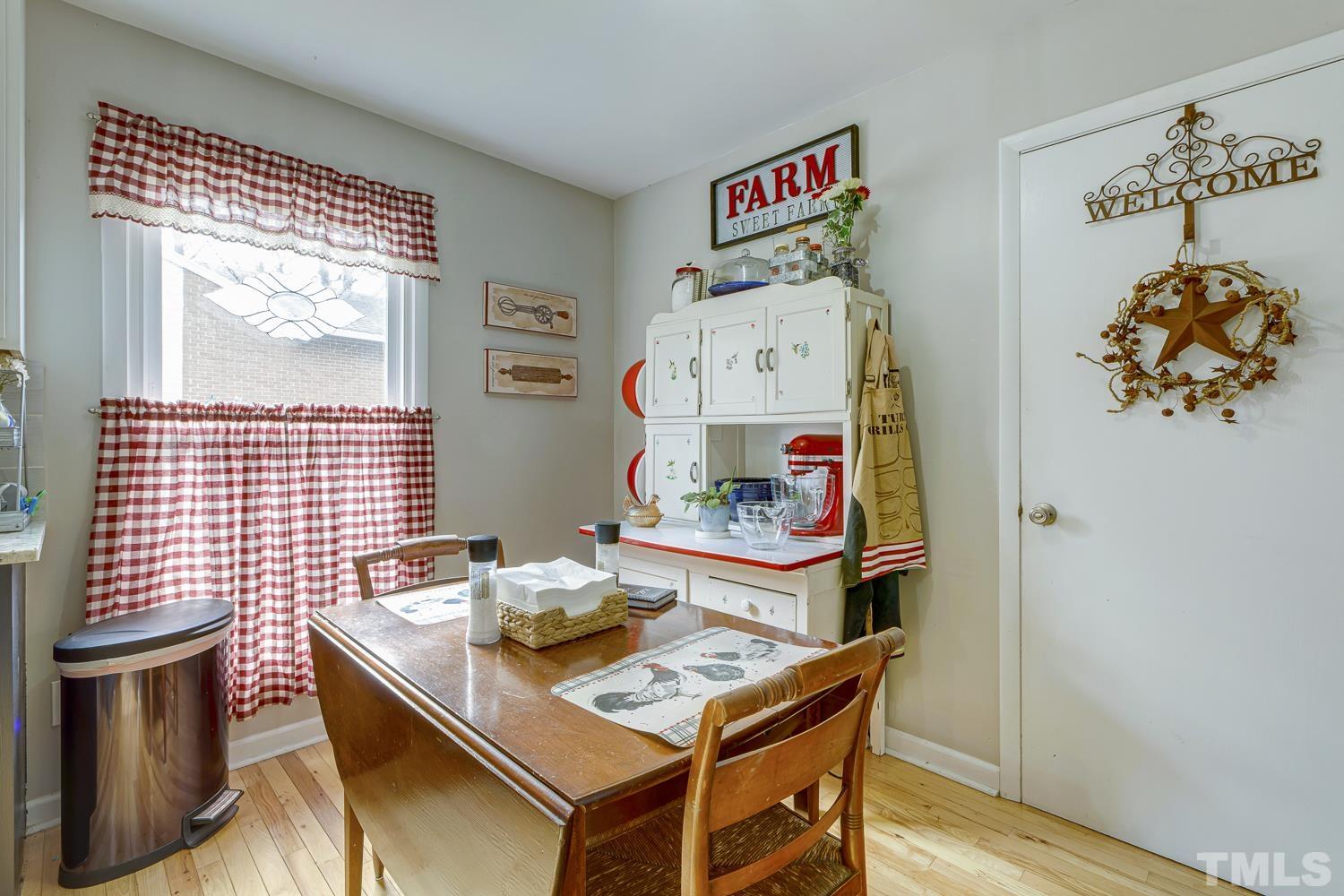 903 Buckhorn Road Garner, NC 27529 - Photo 8 of 15 a view of a dining room with furniture