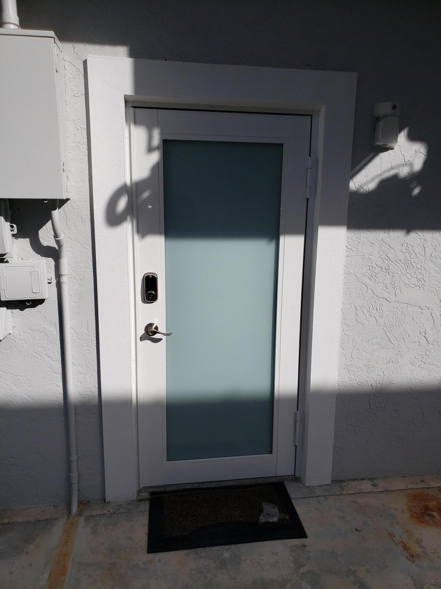 169 Corrine Place Key Largo, FL 33037 - Photo 6 of 6 a view of a hallway with front door
