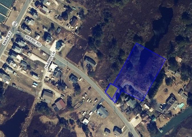 12 Beebe Road, Unit 12 Chincoteague Island, VA 23336 - Photo 1 of 2 a city view with tall buildings