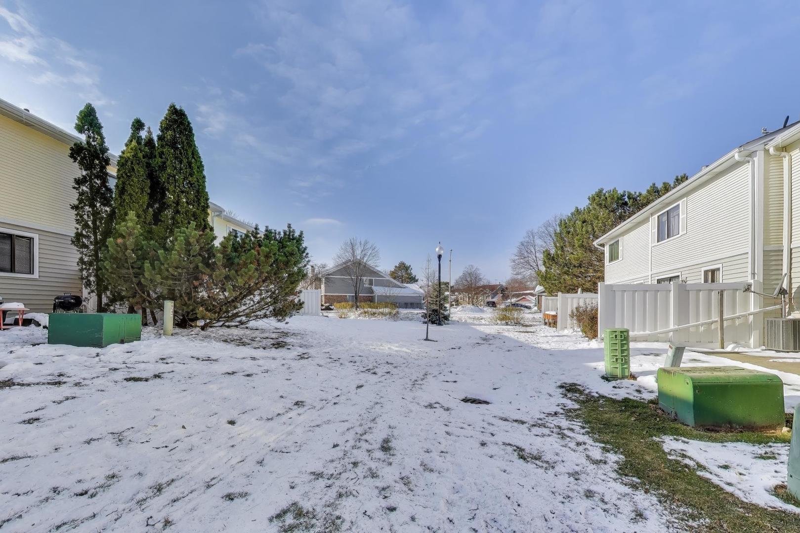 637 Bridgeview Point Schaumburg, IL 60194 - Photo 28 of 28 a view of a dirt road and a building