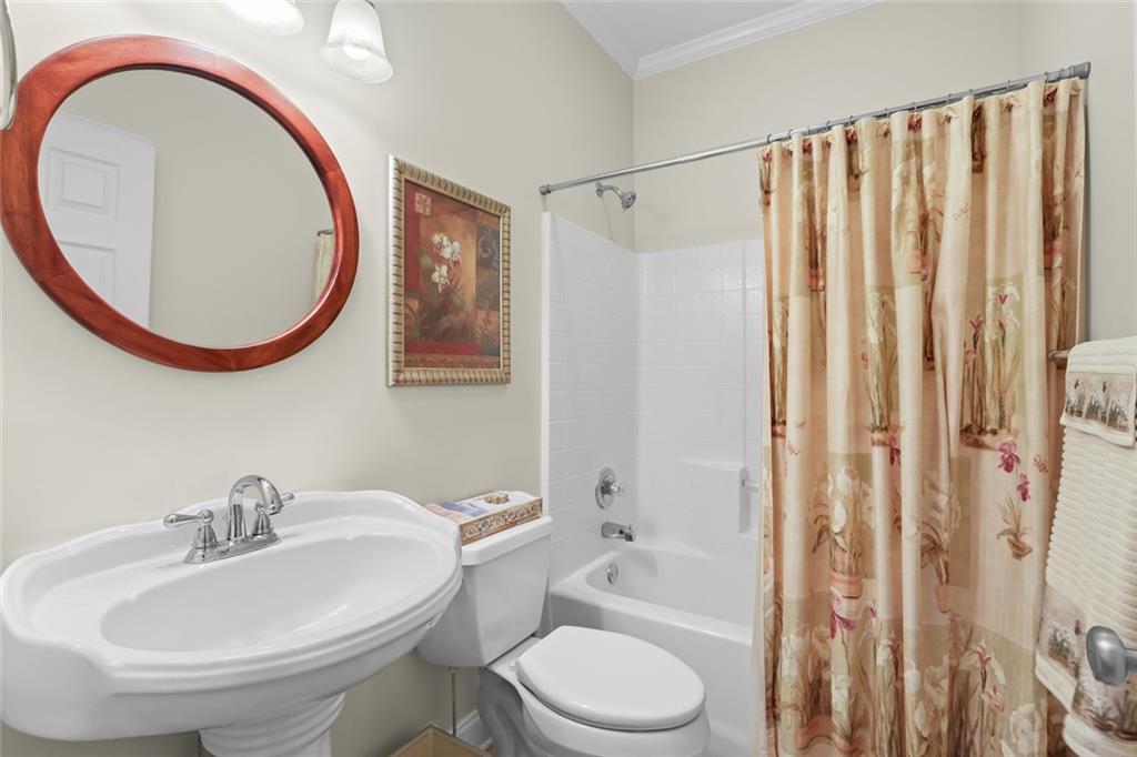 1168 Highland Road Sautee Nacoochee, GA 30571 - Photo 32 of 65 a bathroom with a toilet a sink and a mirror
