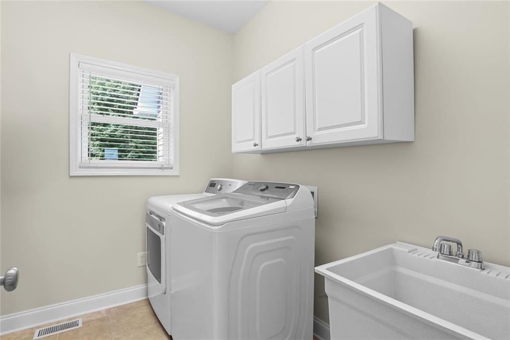1168 Highland Road Sautee Nacoochee, GA 30571 - Photo 34 of 65 a utility room with a sink washer and dryer