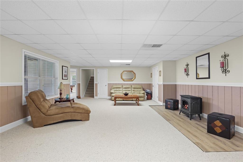1168 Highland Road Sautee Nacoochee, GA 30571 - Photo 39 of 65 a living room with furniture and a fireplace