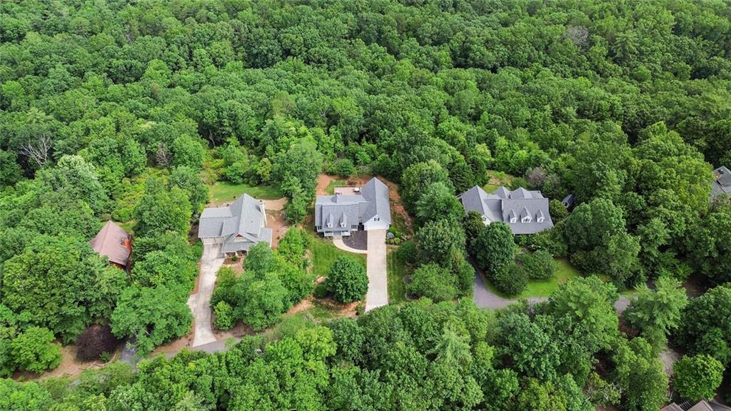 1168 Highland Road Sautee Nacoochee, GA 30571 - Photo 58 of 65 an aerial view of residential house with outdoor space and trees all around