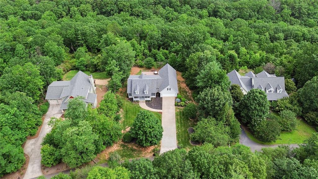 1168 Highland Road Sautee Nacoochee, GA 30571 - Photo 59 of 65 an aerial view of a house with outdoor space and trees all around