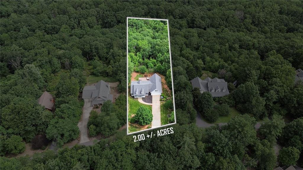 1168 Highland Road Sautee Nacoochee, GA 30571 - Photo 64 of 65 an aerial view of residential house with outdoor space and trees around