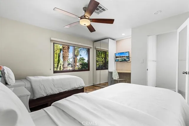 a view of a bedroom from a hallway