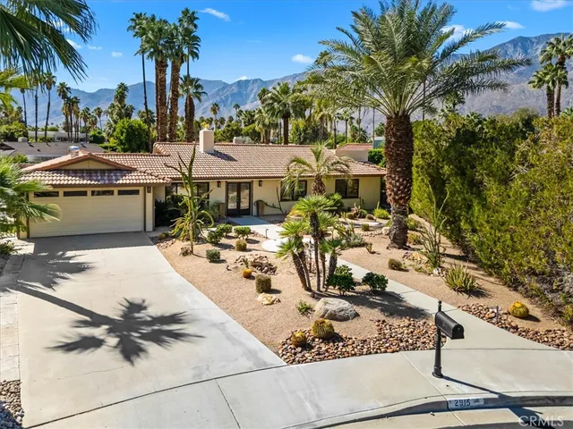 a view of a patio with swimming pool table and chairs